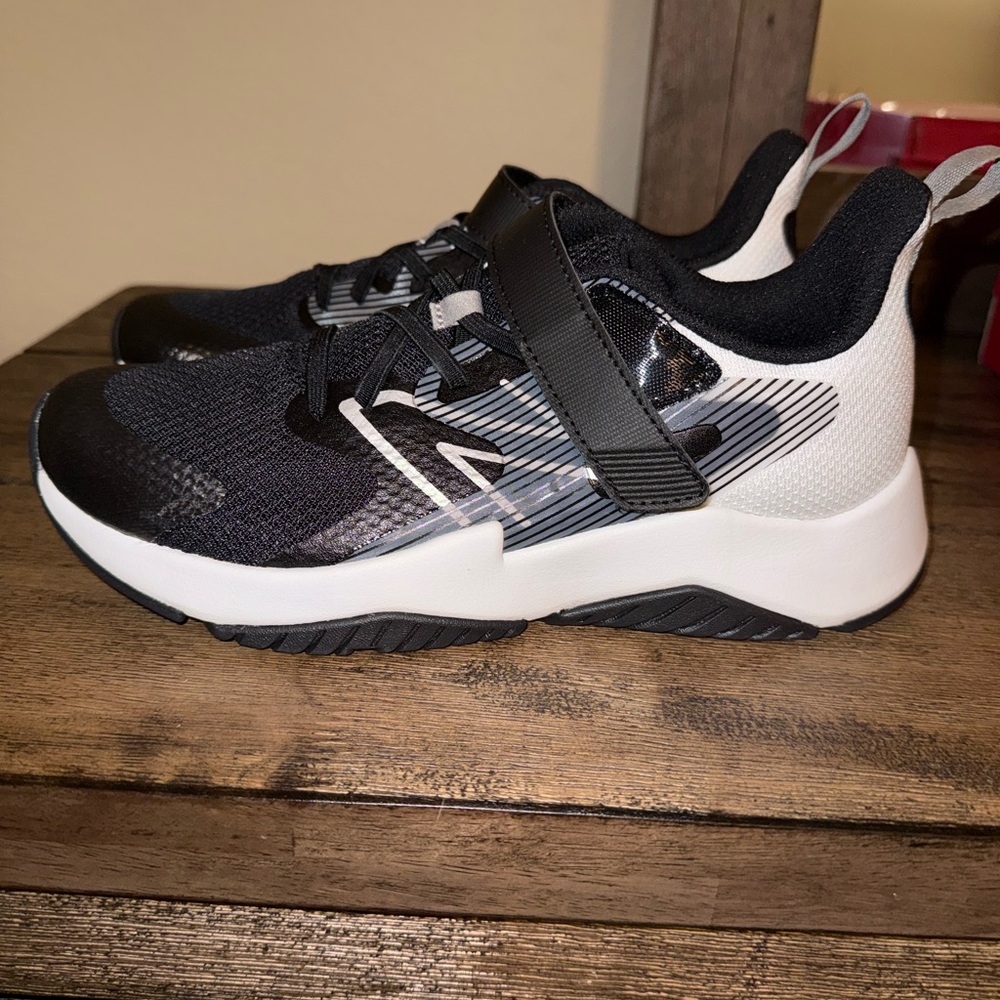 New Balance Kids Black and White Sneakers
